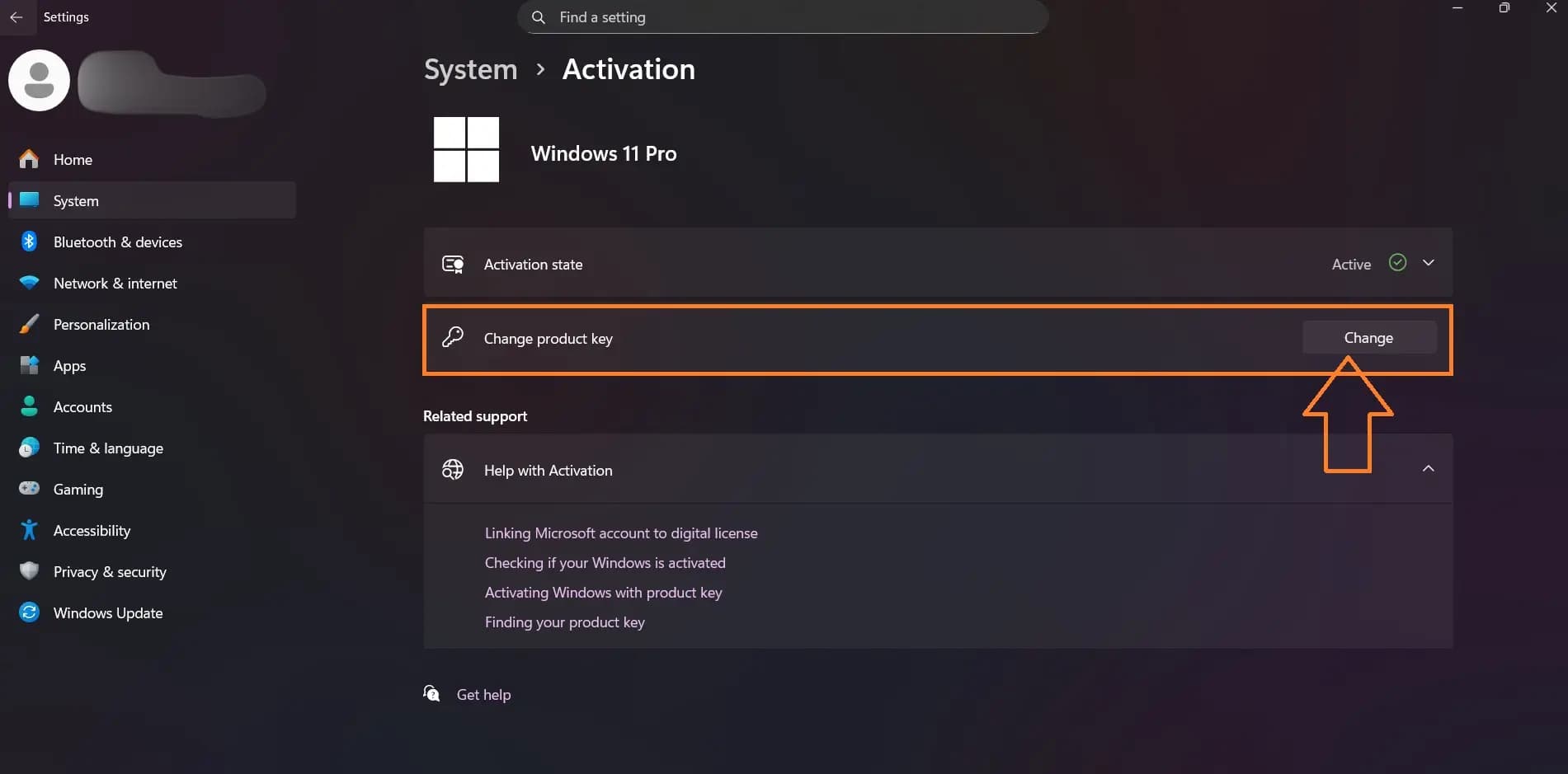 Windows 11 Settings Activation page with the Change button next to Change product key highlighted